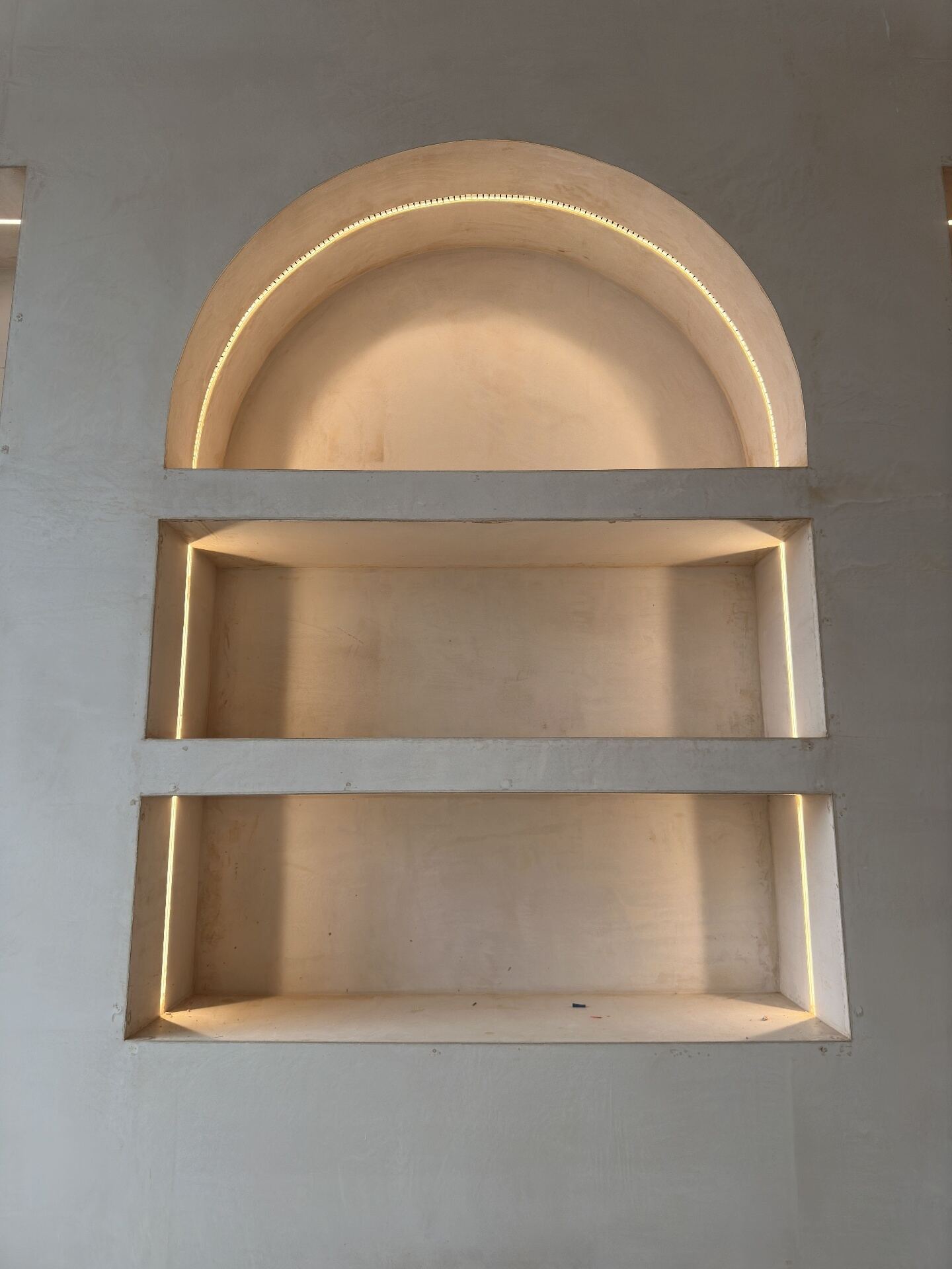 LED feature lighting fitted into an arched alcove