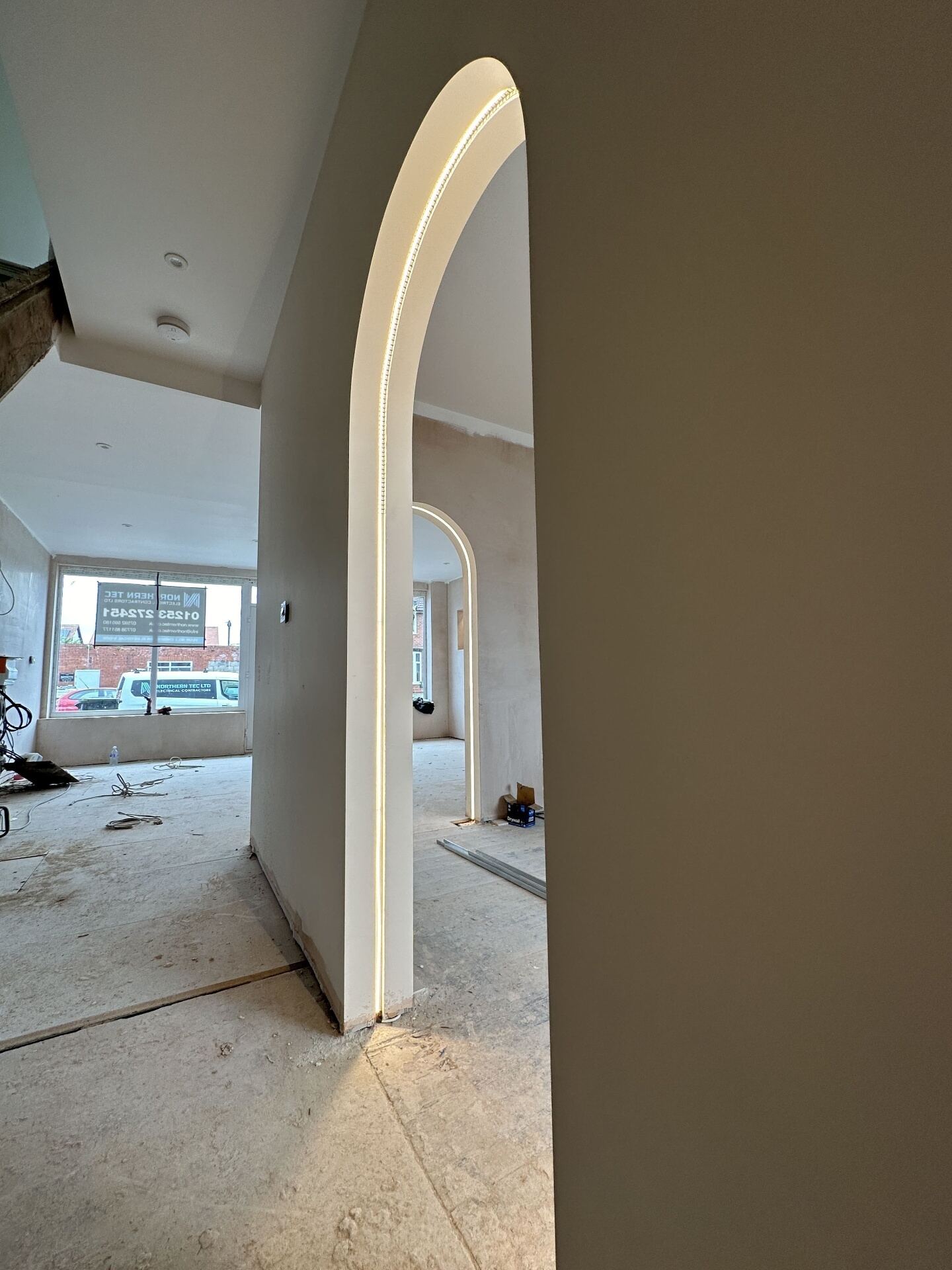 Hallway arch finished with concealed LED lighting