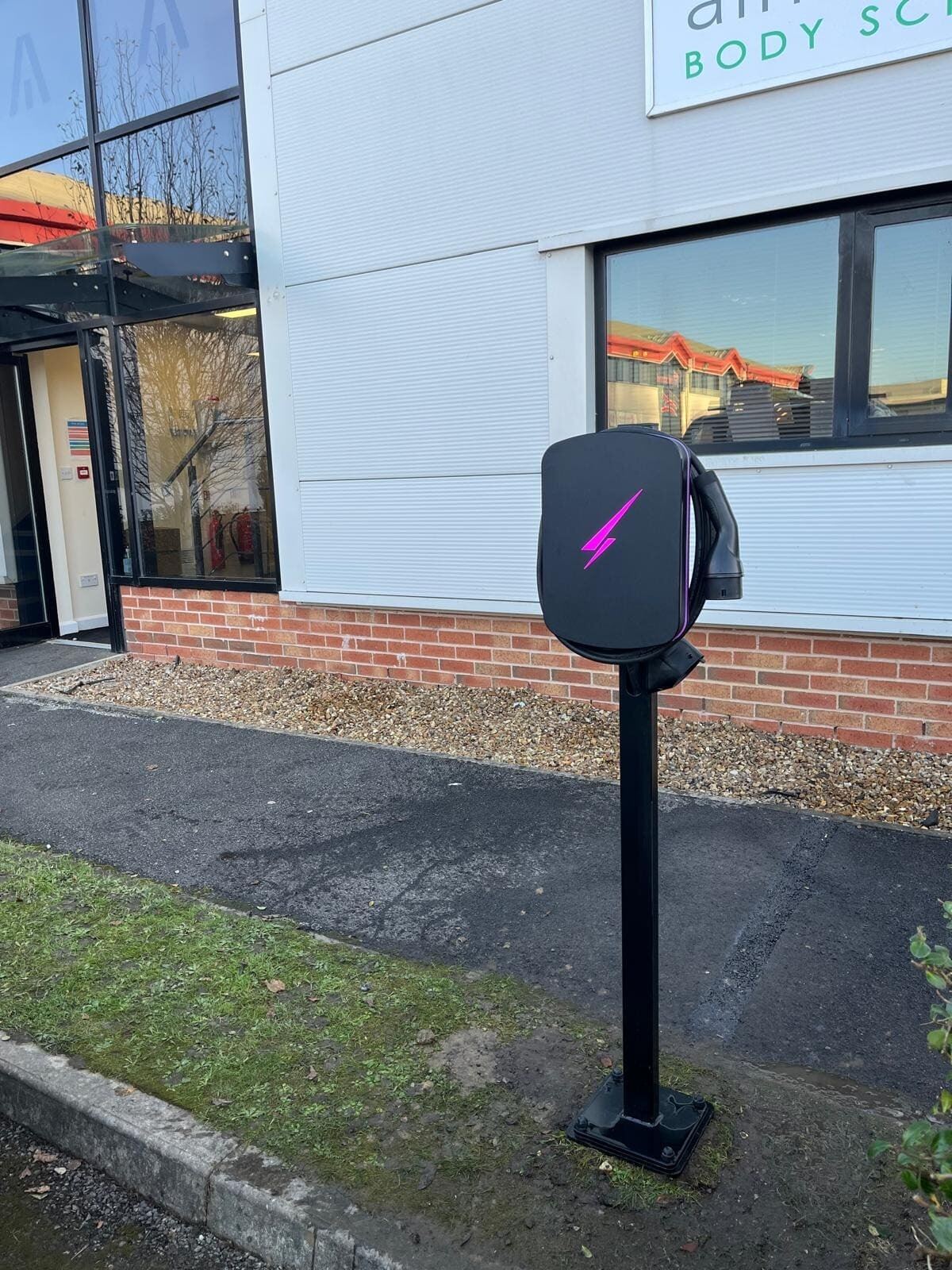 Commercial pedestal-mounted EV charger installation