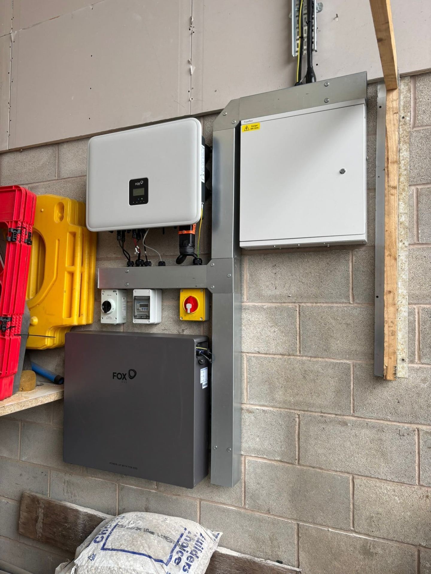 Electrician fitting a domestic EV charge point